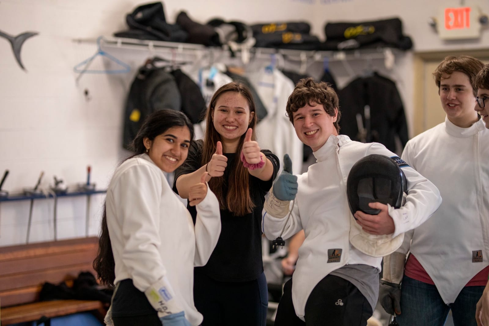 Fencers giving thumbs up at the club